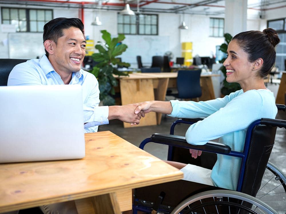 Occupational therapist working with client